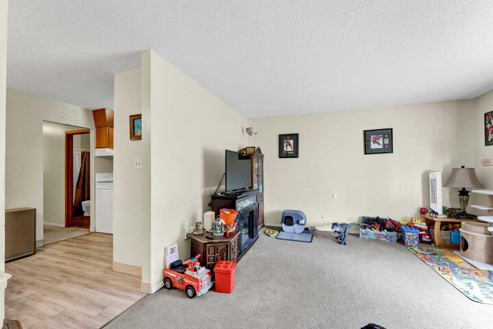 Property Photo:  662/664 1 Street SW  AB T1A 3Z4 