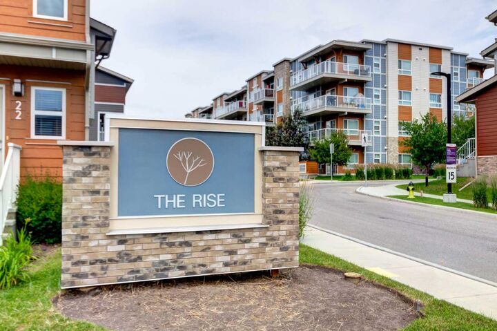 Property Photo: 370 Harvest Hills Common NE 307 AB T3K 2M8