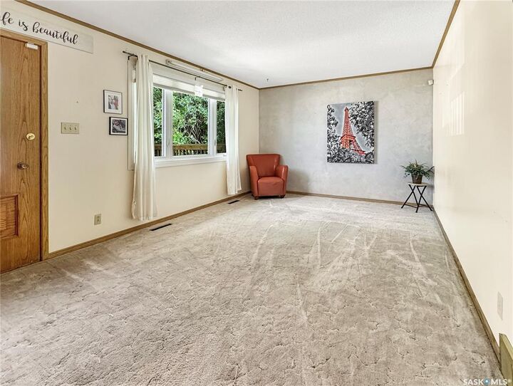 Property Photo: 11310 Asquith Avenue SK S9A 2N8