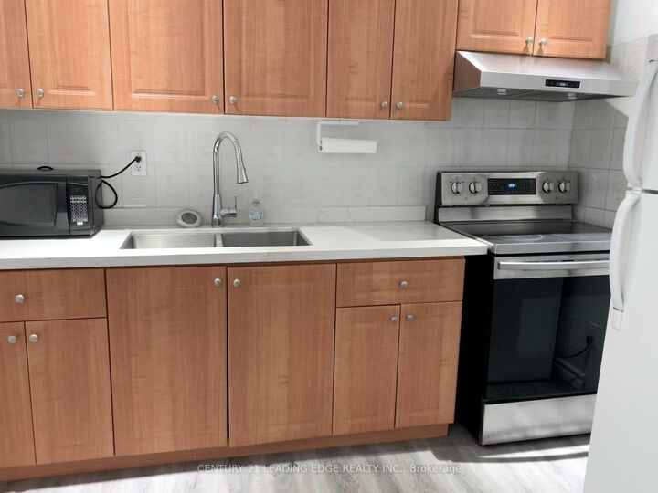 Property Photo:  30 Huron Street Main Level Back  ON M5T 2A3 