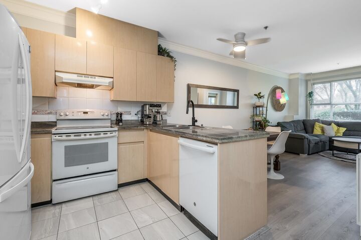 Property Photo: 8115 121A Street 107 BC V3W 1J2