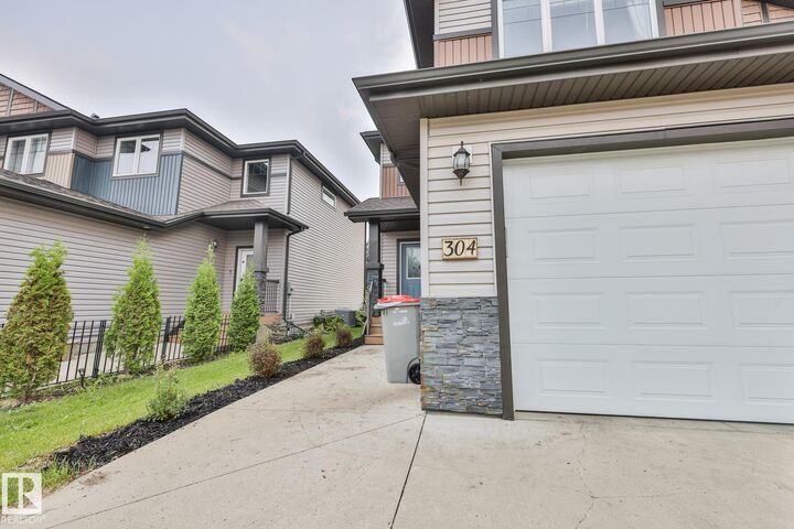 Property Photo: 304 Genesis Villa(S) AB T7Z 0J6