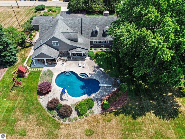 Property Photo:  115 Golfside Drive  MI 48801 
