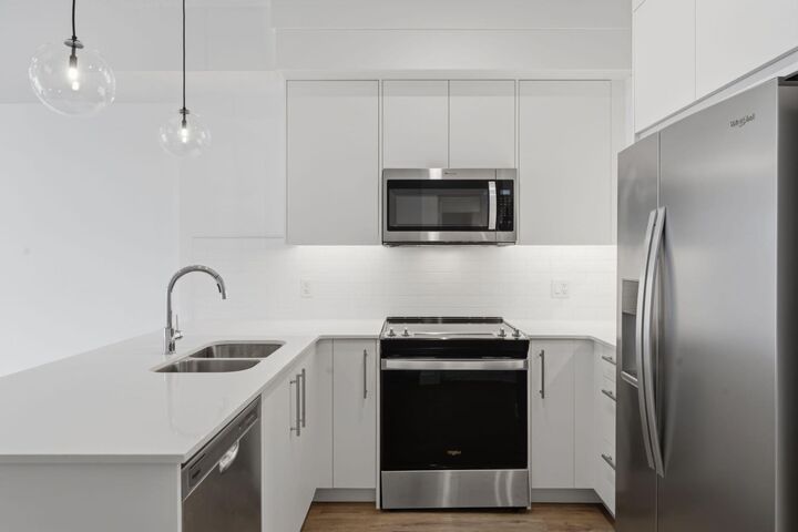 Property Photo: 265 Wolf Willow Boulevard SE 2110 AB T2X 6P9