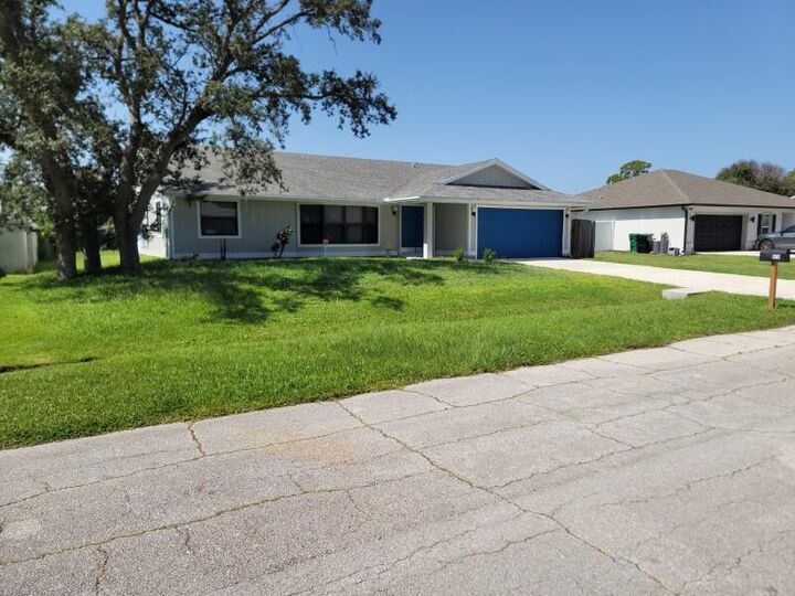 Property Photo:  974 SE Belfast Avenue  FL 34983 
