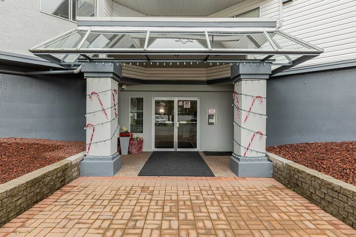 Property Photo: 5377 201A Street 205 BC V3A 1S7