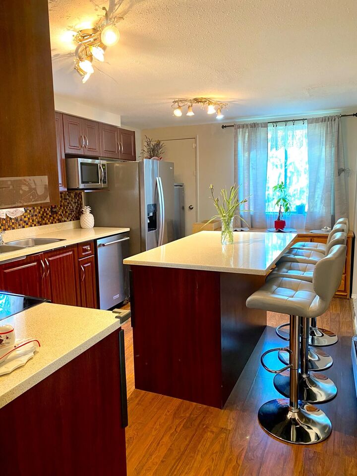 Property Photo: 8555 King George Boulevard 43 BC V3W 5C3