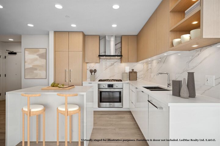 Property Photo: 4988 Bennett Street 806 BC V5H 0L1