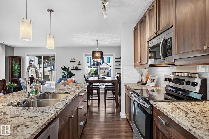 Property Photo:  6642 Cardinal Road SW  AB T6W 1Y8 