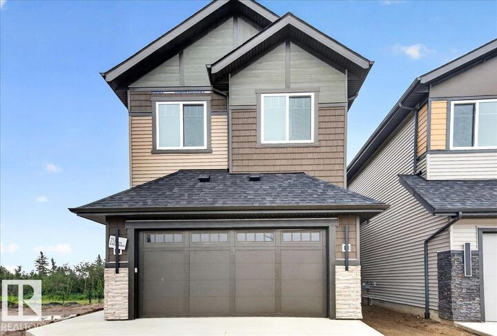Property Photo: 427 172 Avenue NW AB T5Y 4K9