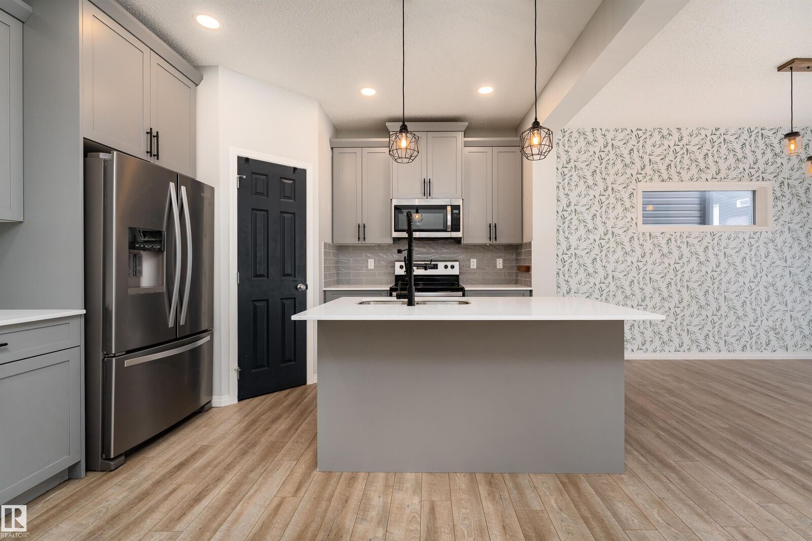 Property Photo:  6484 King Wynd SW  AB T6W 3Z9 