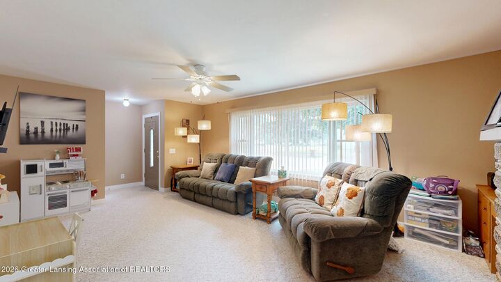 Property Photo:  2406 Lyman Drive  MI 48912 