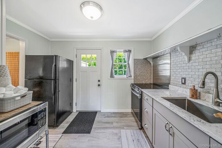 Property Photo:  3 Bay Lane  NY 11719 