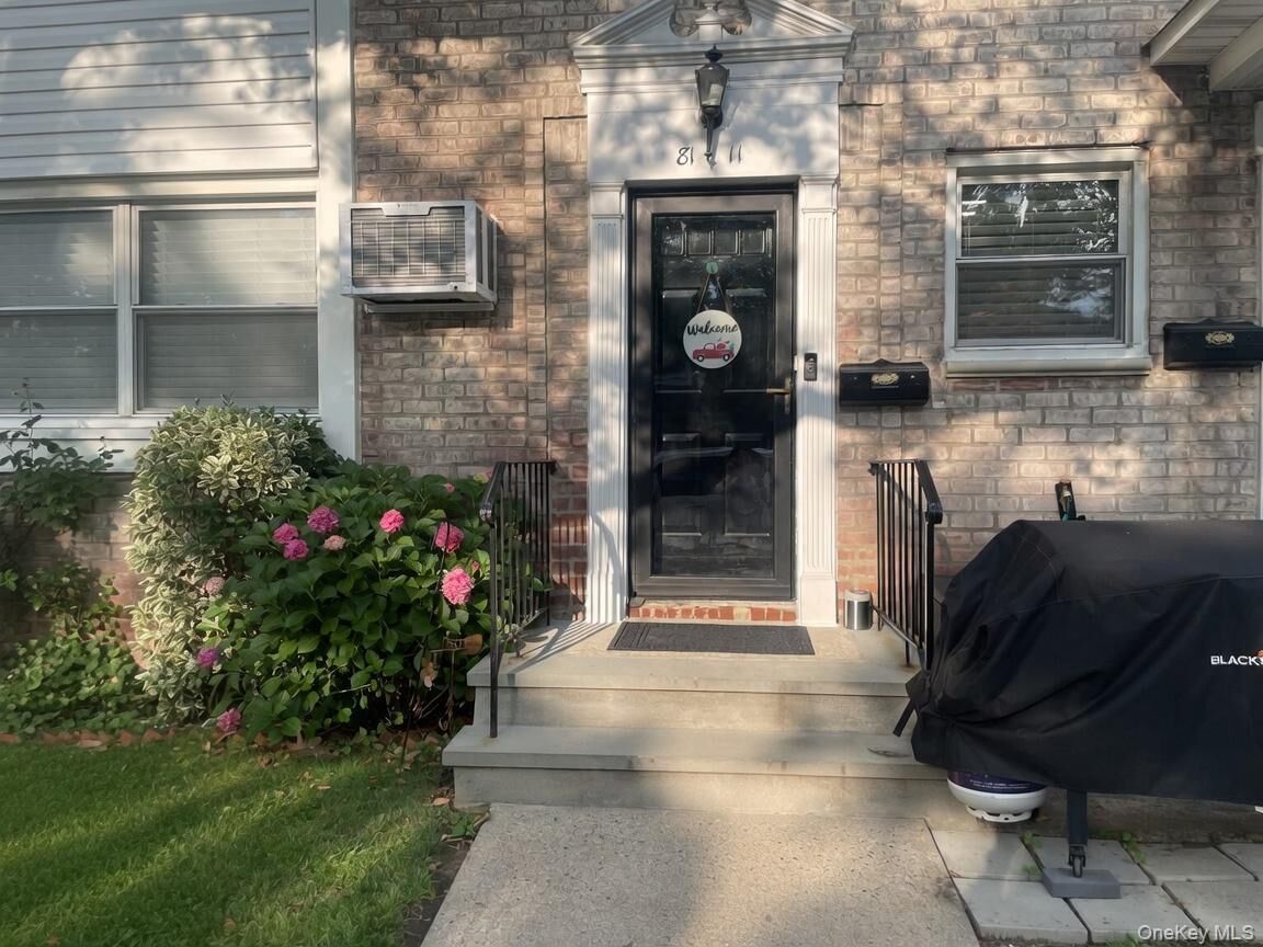 Property Photo: 81-11 Langdale Street 216A NY 11040