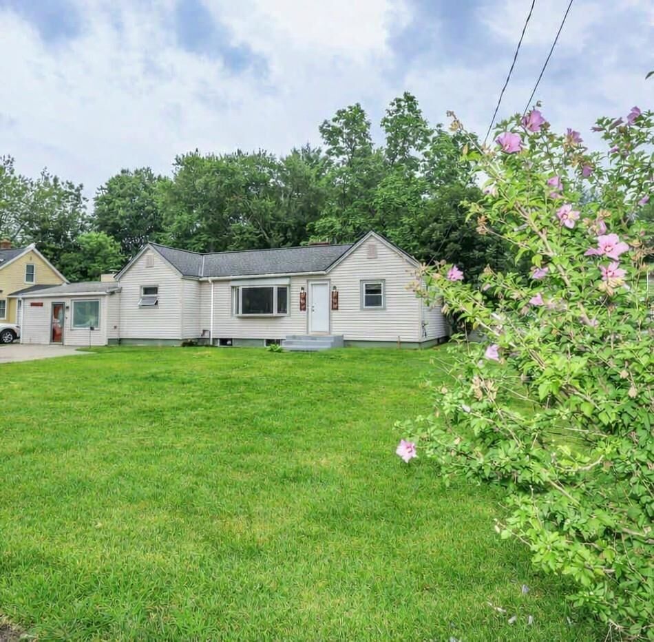 Property Photo:  124 Huse Road  NH 03103 