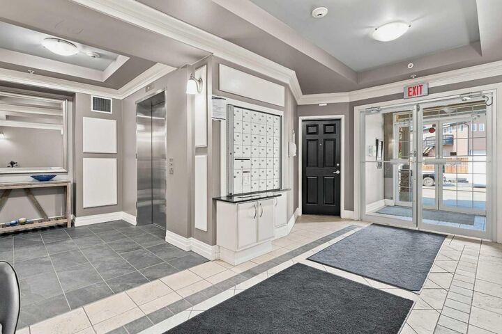 Property Photo: 25 Prestwick Drive SE 208 AB T2Z 4Z1