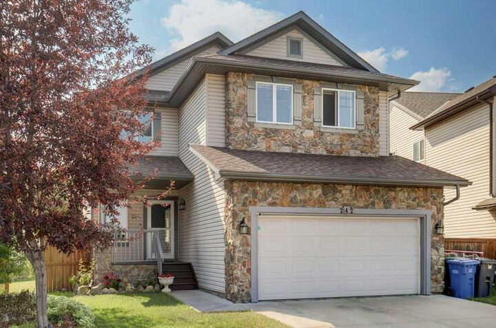 Property Photo: 242 Crystal Green Point AB T1S 2K7