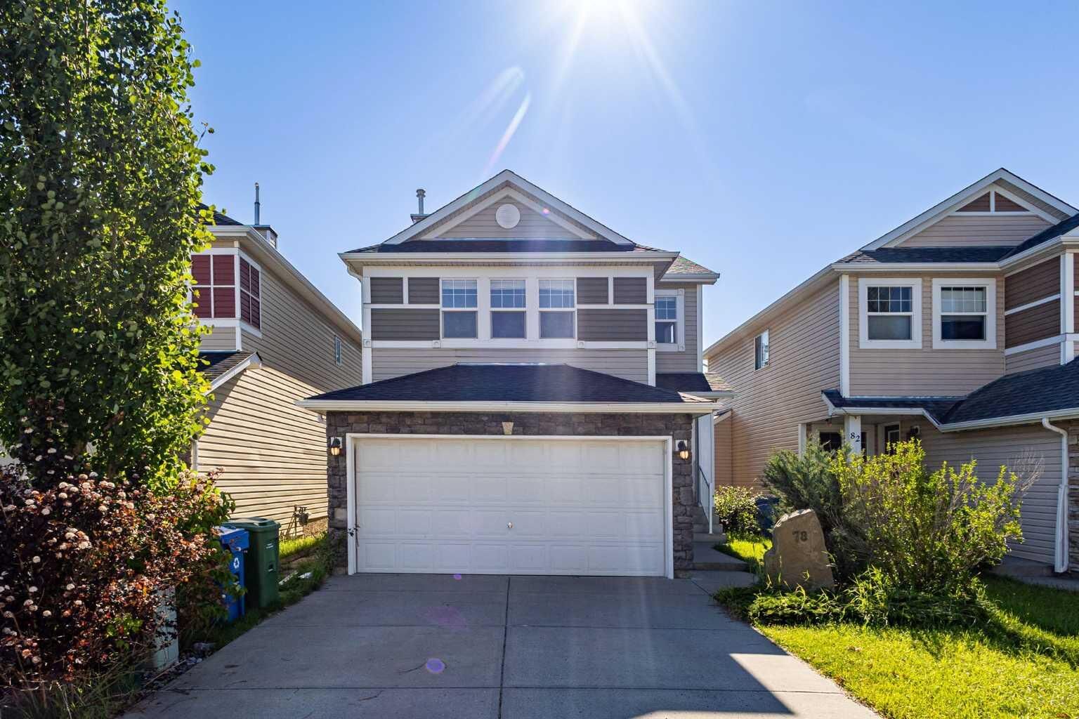 Property Photo: 78 Cougar Plateau Way SW AB T3H 5S4