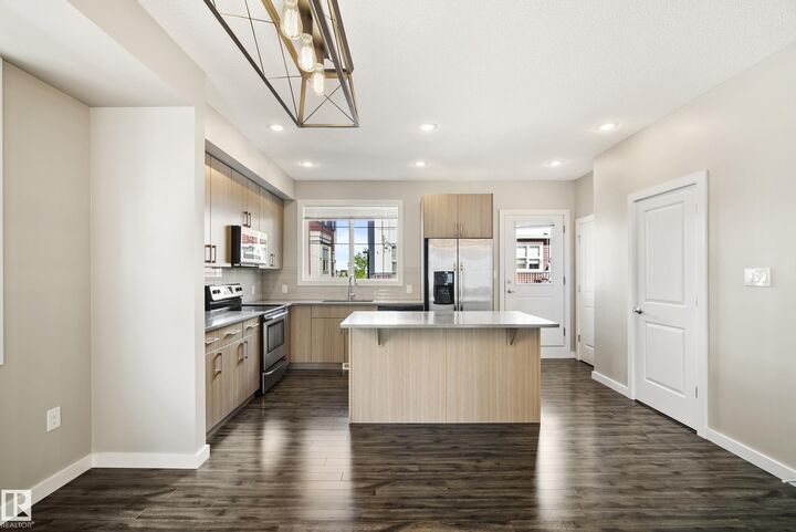 Property Photo: 2803 James Mowatt Trail SW 82 AB T6W 2P5