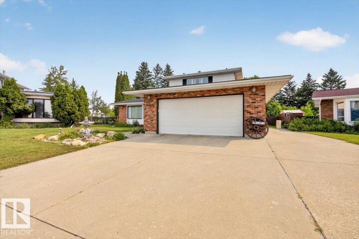 Property Photo: 4027 74 Street NW AB T6K 0W7