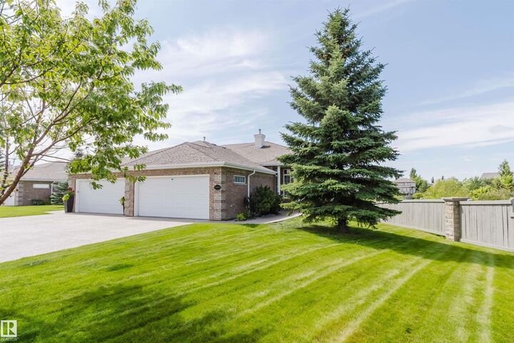 Property Photo: 6604 Sandin Cove NW AB T6R 0G2