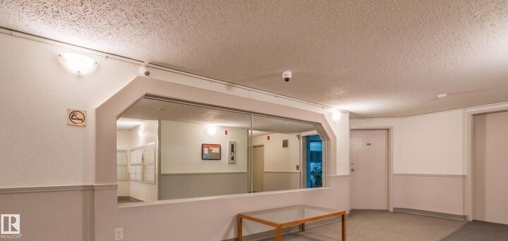 Property Photo: 17109 67 Avenue NW 104 AB T5T 6E6