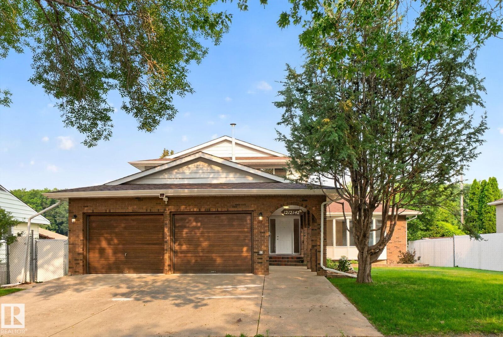 Property Photo: 12121 42 Street NW AB T5W 2M8