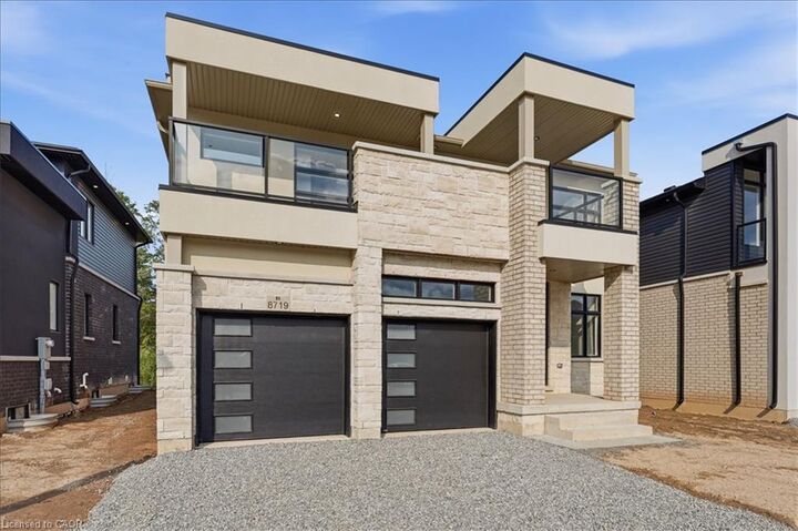 Property Photo:  8719 Harlyn Common  ON L2G 0E4 