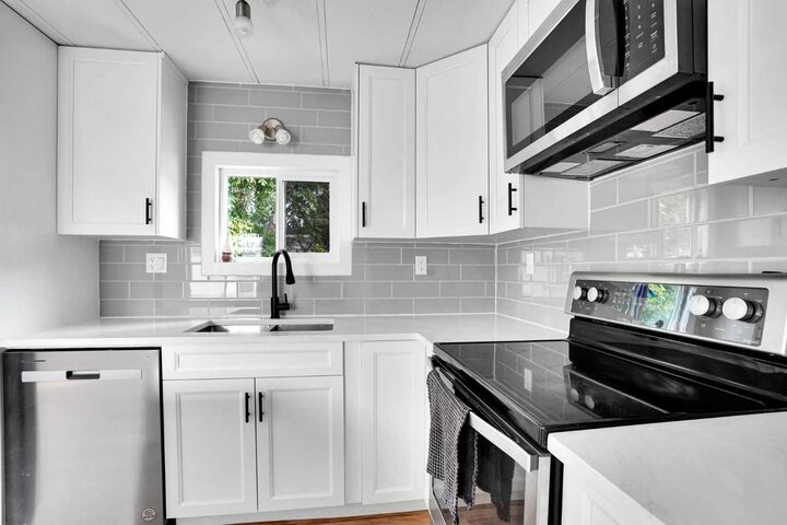Property Photo: 64 Huntwell Way NE AB T2K 5T2