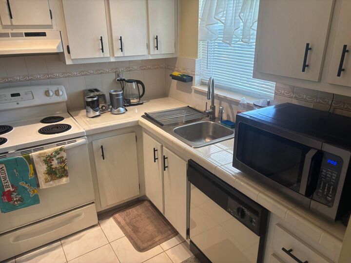 Property Photo:  6670 Royal Palm Boulevard 308K  FL 33063 