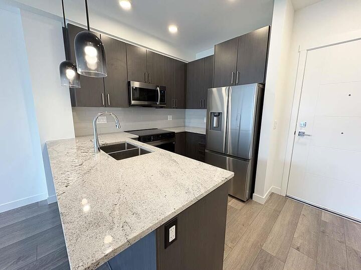 5504 Brydon Crescent 203 — photo 1