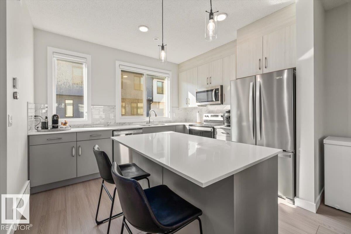 Property Photo: 11910 35 Avenue SW 30 AB T6W 4Z8
