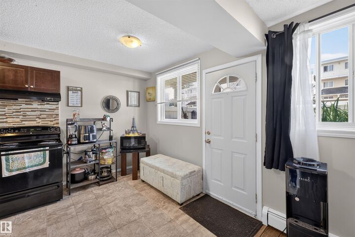 Property Photo:  14520 52 Street NW 102  AB T5A 3K5 