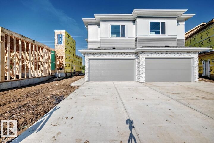 Property Photo: 106 Waverly Way AB T8L 0Z8