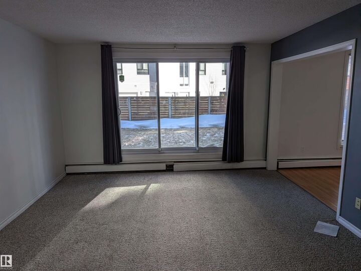 Property Photo:  7220 144 Avenue NW 109  AB T5C 3E4 