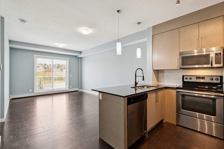 Property Photo:  5305 32 Avenue 4313  AB T3E 8A2 
