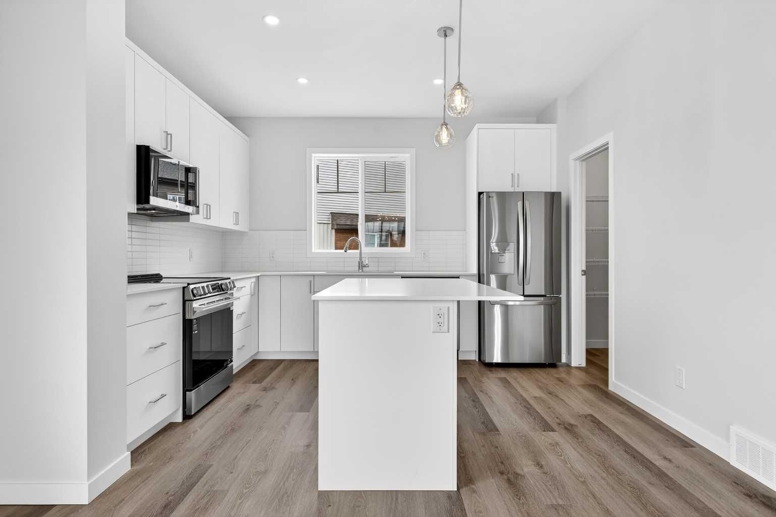 Property Photo: 28 Red Embers Plaza NE 206 AB T3N 2W1
