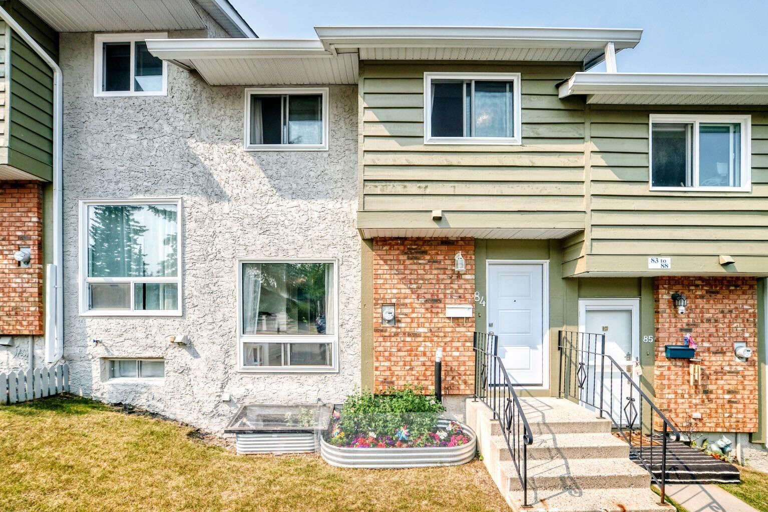 Property Photo:  6915 Ranchview Drive NW 84  AB T3G 1R8 