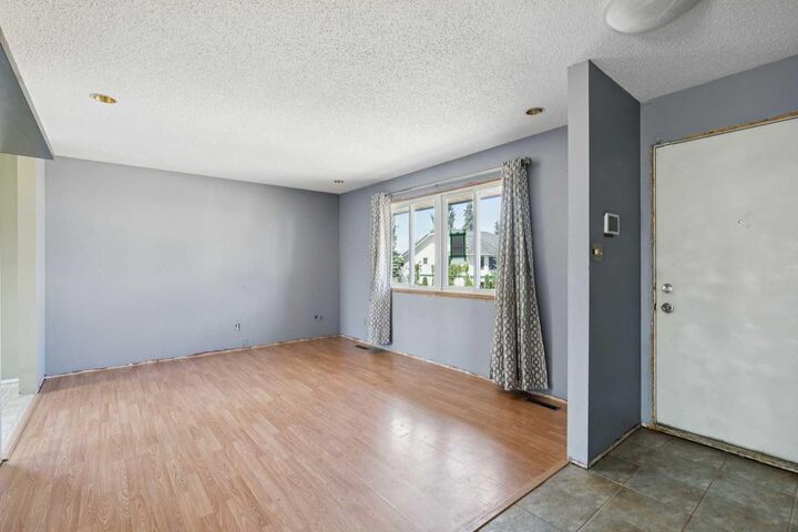 Property Photo: 126 Thistle Way AB T1P 1C6