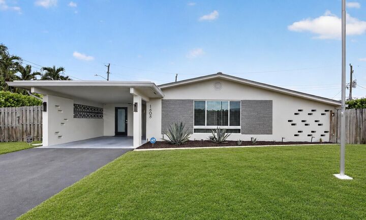 Property Photo: 1608 NE 14th Terrace FL 33305