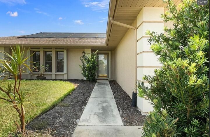 Property Photo:  329 SE Oakridge Drive  FL 34984 