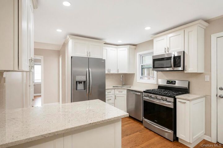 Property Photo: 52 E Fenimore Street NY 11580