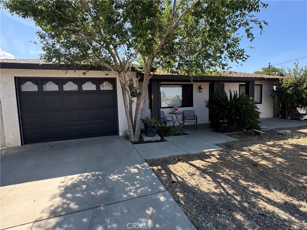 Property Photo:  11968 Bornite Ave  CA 92345 