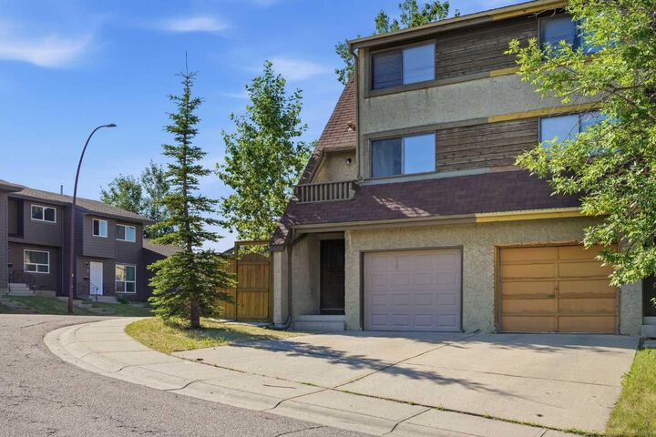 Property Photo: 7003 Ranchero Road NW AB T3G 1J6