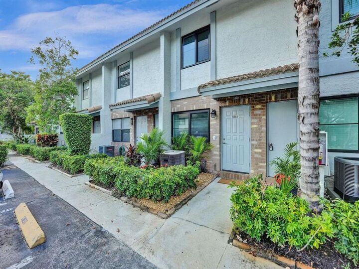 Property Photo:  9845 Riverside Drive 8-28  FL 33071 
