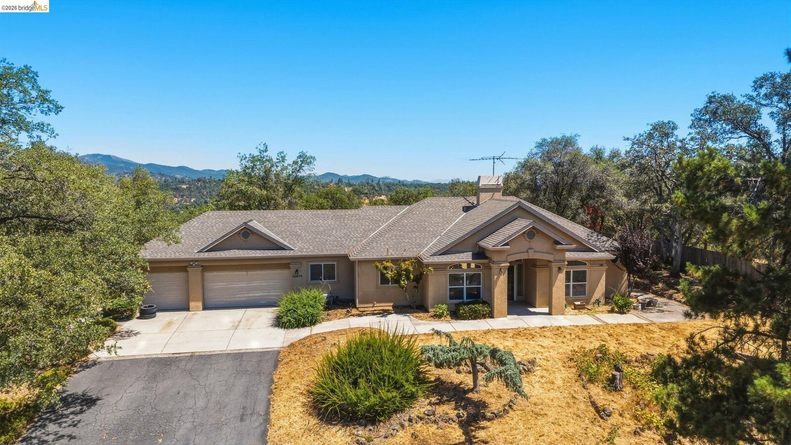 Property Photo: 16475 Crestridge Ave CA 95370