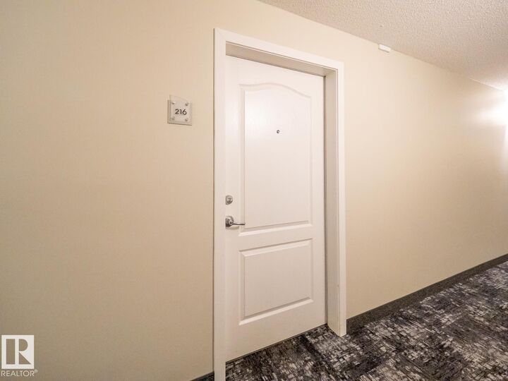 Property Photo: 392 Silverberry Road NW 216 AB T6T 0H1