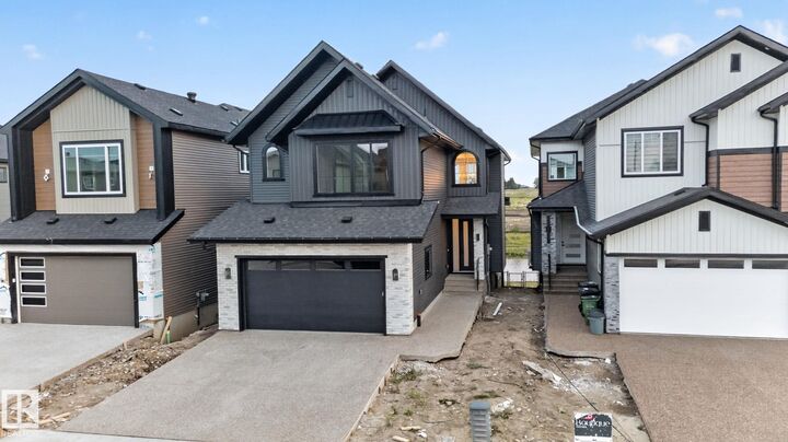 Property Photo: 8791 Mayday Ln SW AB T6X 3E9