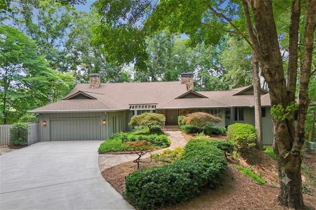 Property Photo: 9415 Huntcliff Trace GA 30350