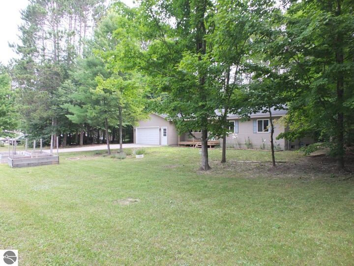 Property Photo:  6211 Bellows Lake Road  MI 49650 